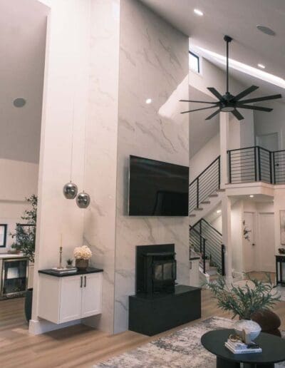 Modern open living room with dining room and stairs to 1st floor - interior designer Hollis NH