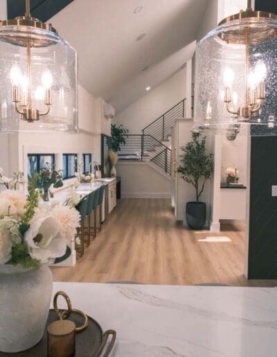 View of entrance hall from table with modern lamps - interior designer Hollis NH