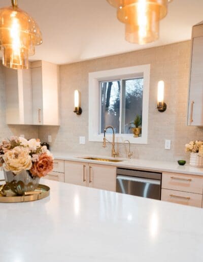 Modern warm kitchen with isle in the middle - interior designer Amherst NH