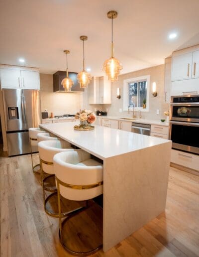 Modern warm kitchen with isle in the middle - interior designer Amherst NH