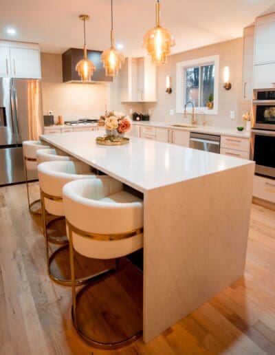 Modern warm kitchen with isle in the middle - interior designer Amherst NH