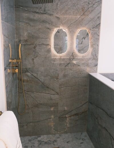 Modern shower with brown marble finish - interior designer Nashua
